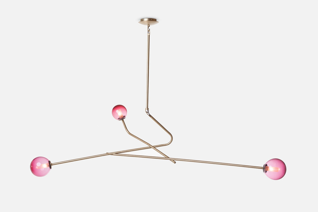 BRUSHED BRASS AND PINK GLASS