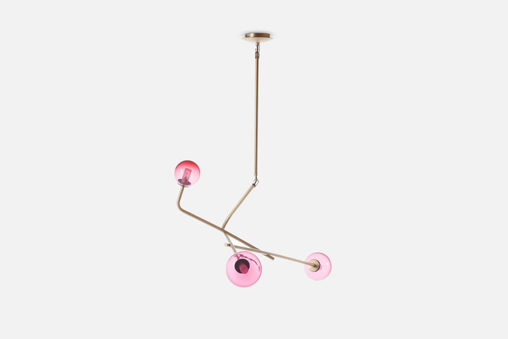 BRUSHED BRASS AND PINK GLASS